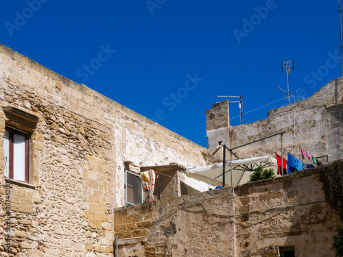 Houses in picturesque old town of Gallipoli, a beautiful travel destination in Puglia, Italy