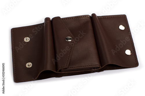 Open brown leather wallet on a white background