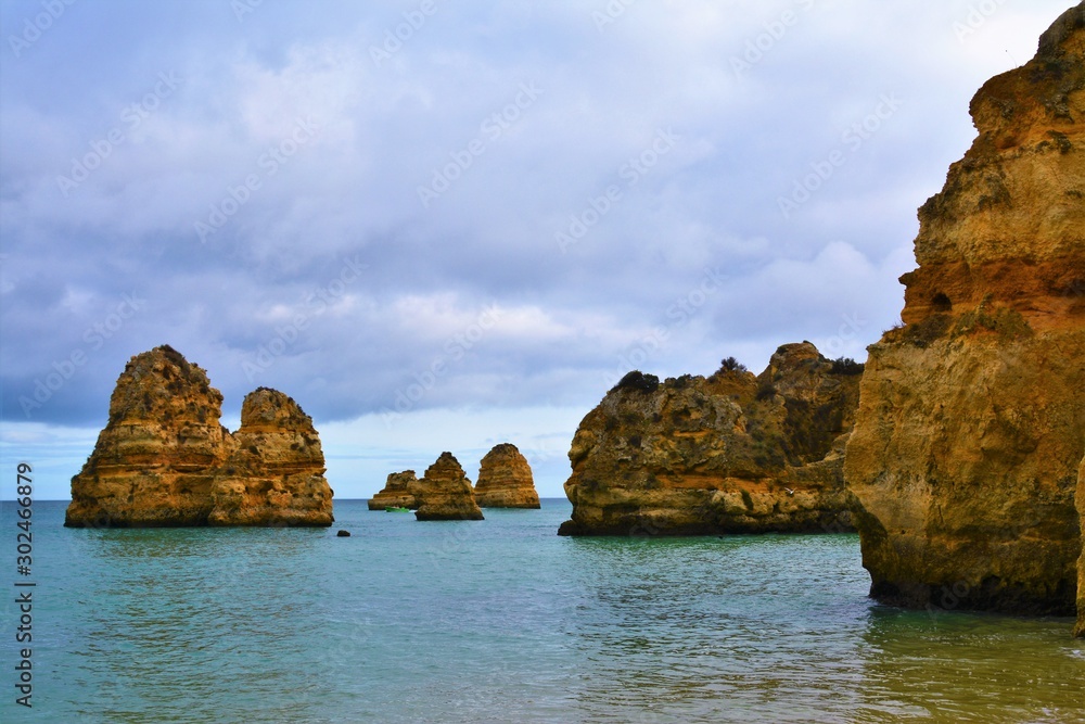 rocks and caverns on the ocean coast in Lagos - Portugal
