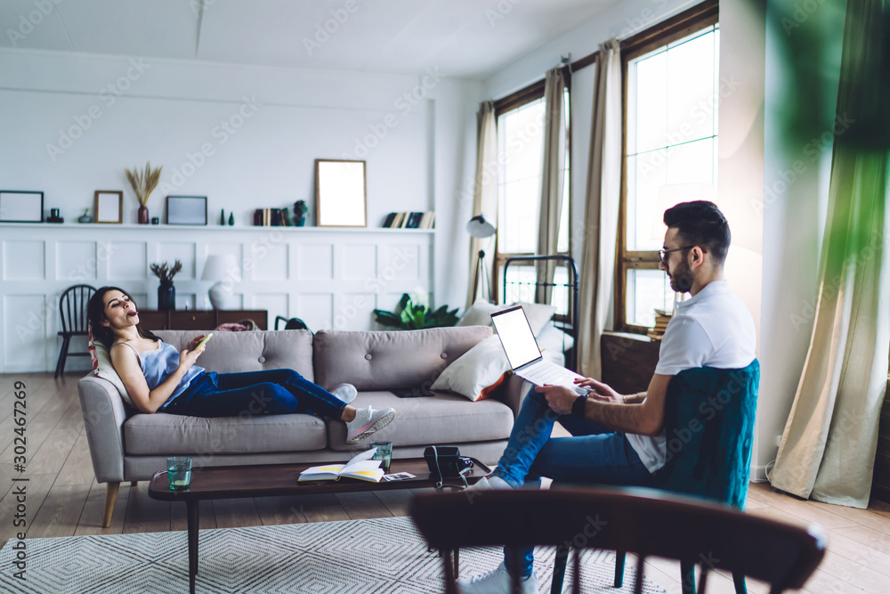 Young couple freelancers working at home Young couple freelancers working at home