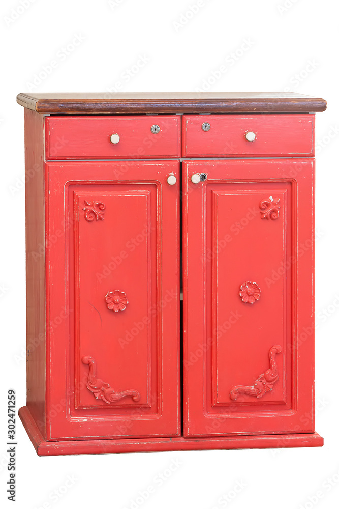 Red retro wardrobe on a white background. Antique wooden sideboard Red retro wardrobe on a white background. Antique wooden sideboard