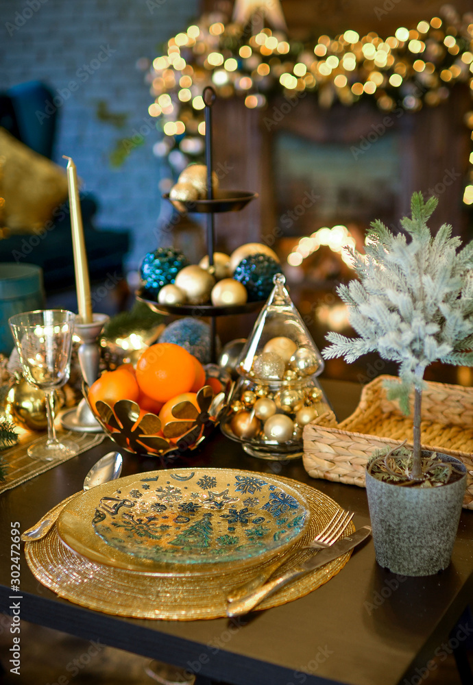 Christmas decorations on a large wooden table. Fir cones and branches are sprinkled with snow and decorated with a garland. Christmas decorations on a large wooden table. Fir cones and branches are sprinkled with snow and decorated with a garland.