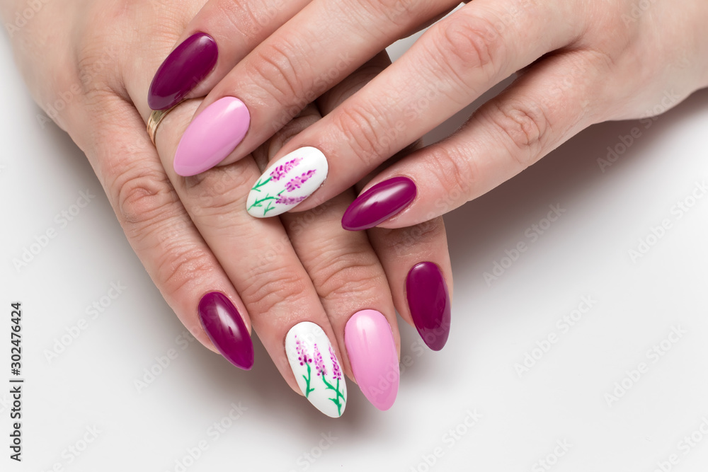 Almond long form of nails. Purple manicure. Painting lavender on the nails.  Violet manicure. Stock Photo | Adobe Stock