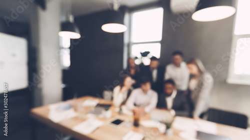 Fotografía Business team in meeting room, blur background