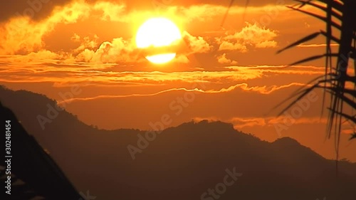 Cloudy Sunset Over Mountain Range, Philippines photo