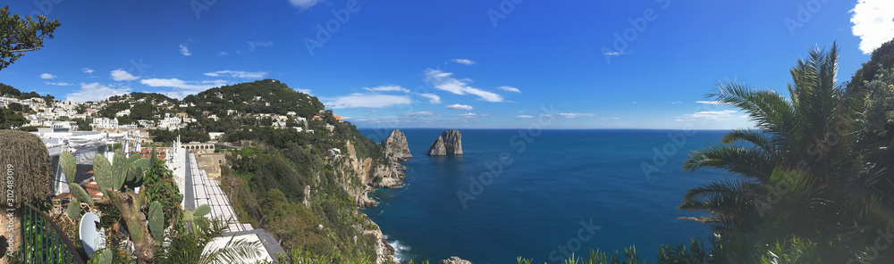background panoramic view of the sea and the Faraglioni rocks in the town of Capri on the island of Capri, Campania, Italy, Europe
