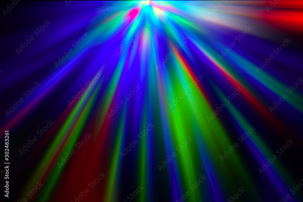 Fototapeta premium Multicolored rays of light shine through the facets of the crystal