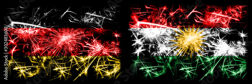 Germany, German vs Kurdistan, Kurdish New Year celebration travel sparkling fireworks flags concept background. Combination of two abstract states flags. © Vlad
