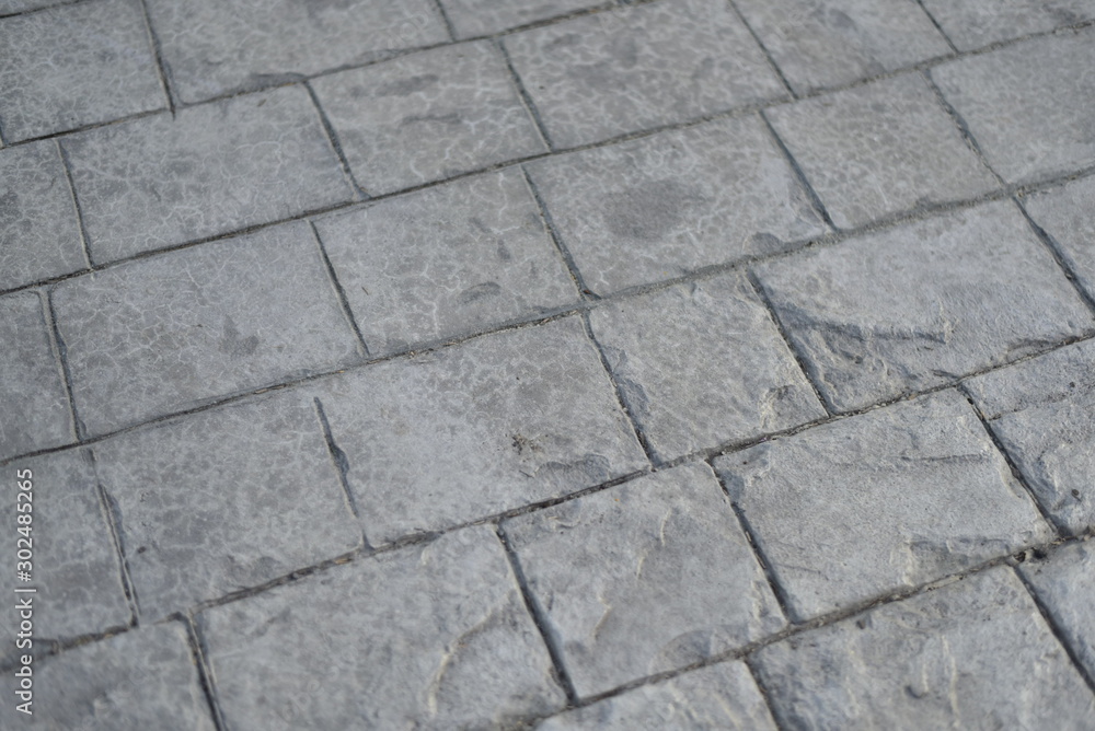 cobblestone concrete stamp's pattern texture detail in walking street with close up detail