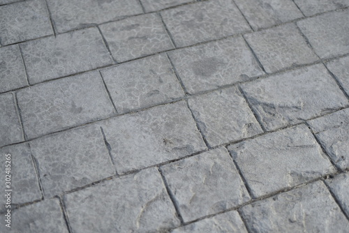 cobblestone concrete stamp s pattern texture detail in walking street with close up detail
