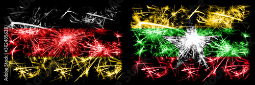 Germany, German vs Myanmar New Year celebration travel sparkling fireworks flags concept background. Combination of two abstract states flags.