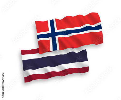 Flags of Norway and Thailand on a white background