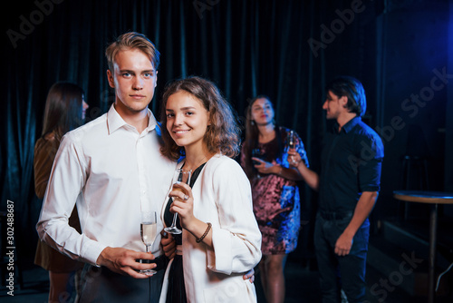 Portrait of lovely couple have party together with their friends