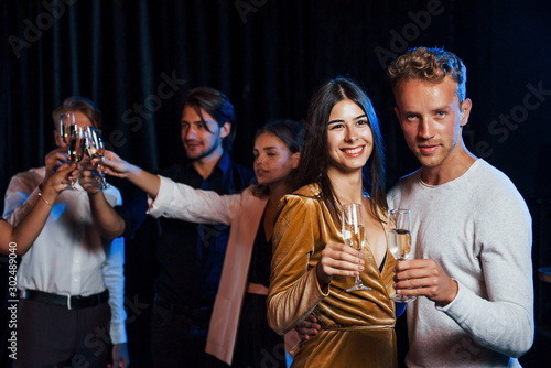 Portrait of lovely couple have party together with their friends