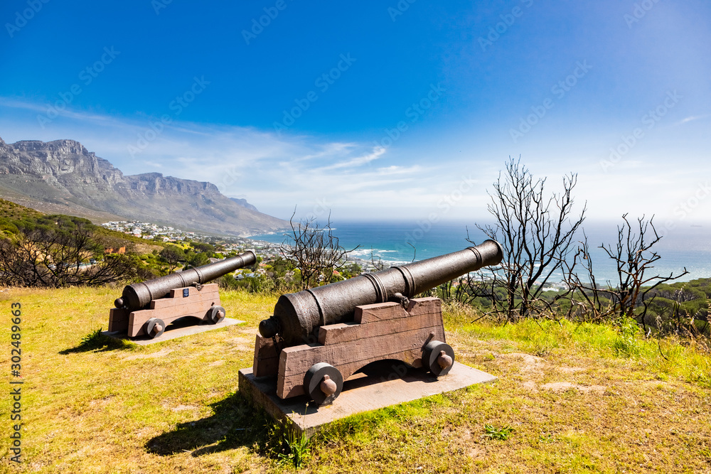 Military Cannons overlooking Camps Bay Beach on the Atlantic Seaboard of Cape Town