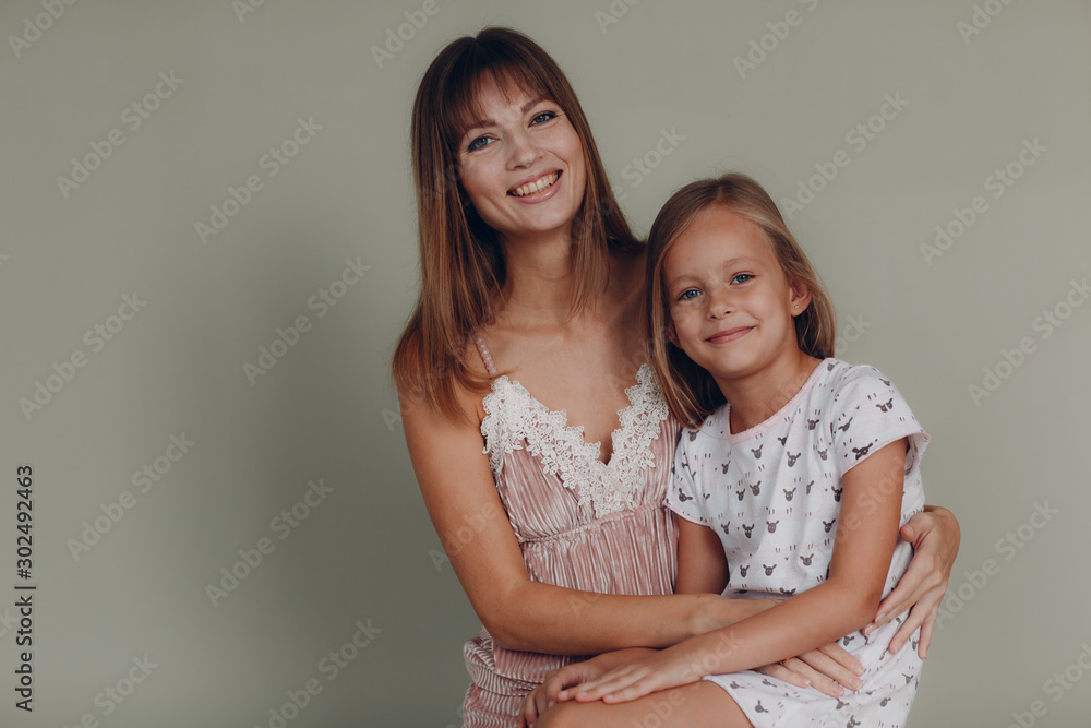 Mother with a little daughter smiling. Family and mother's day concept. Mother with a little daughter smiling. Family and mother's day concept.