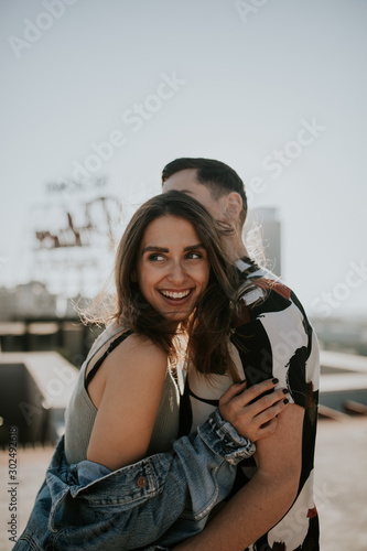 Young couple on rooftop in the city
