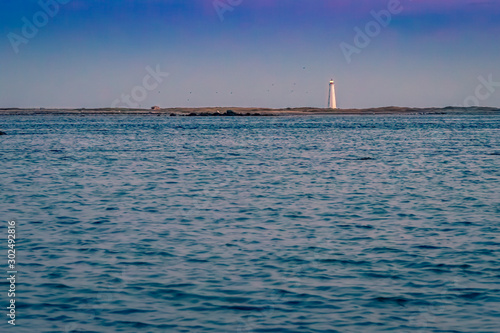 The Cape Sable Island lighthouse seascape on hawk beach along the coastline