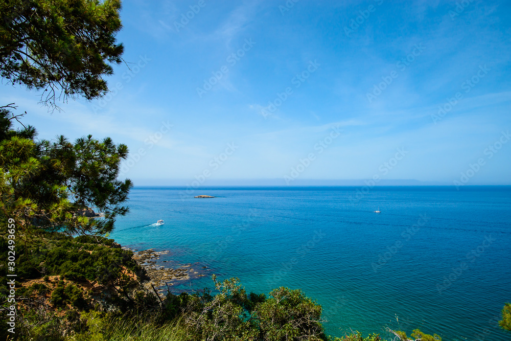 Fototapeta premium bay landscape, wild beach in the blue lagoon, mountains and ocean