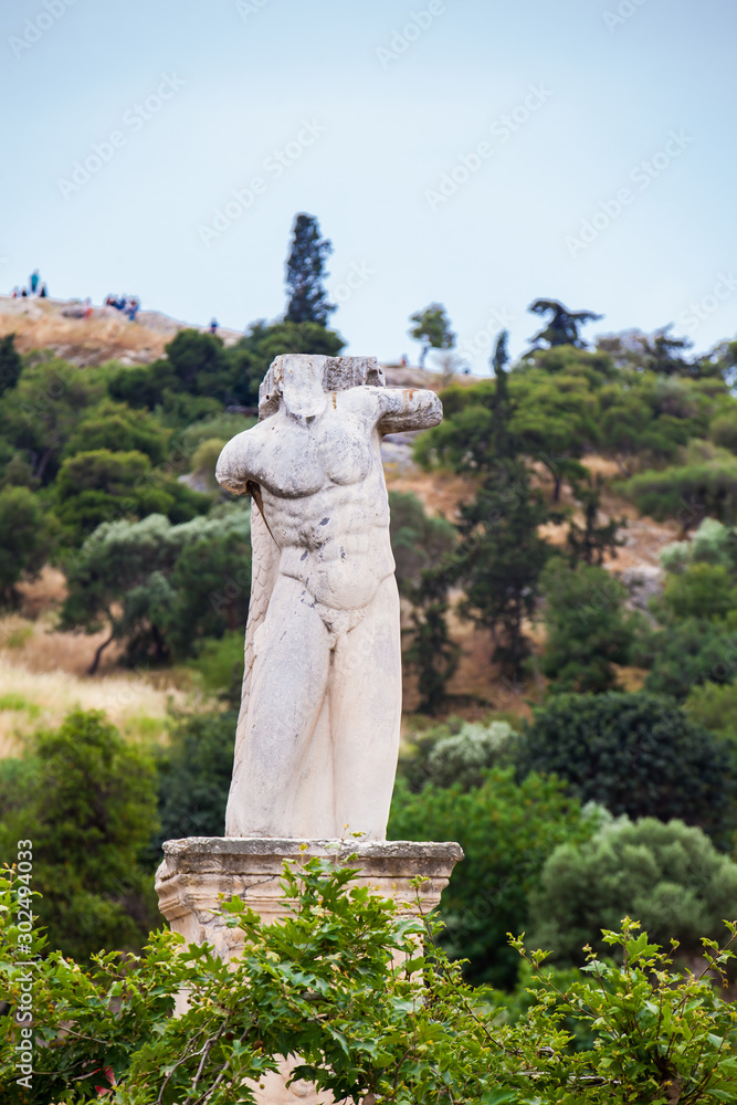 Remains of an antique statue at the ruins of the a Ancient Agora in Athens