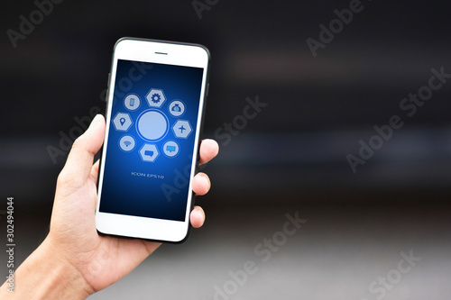 Wallpaper Mural Businessman holding cell phone using Mobile phone or Smart phone Telephone to call phone with Social media Icon technology by WiFi internet  Network digital Torontodigital.ca