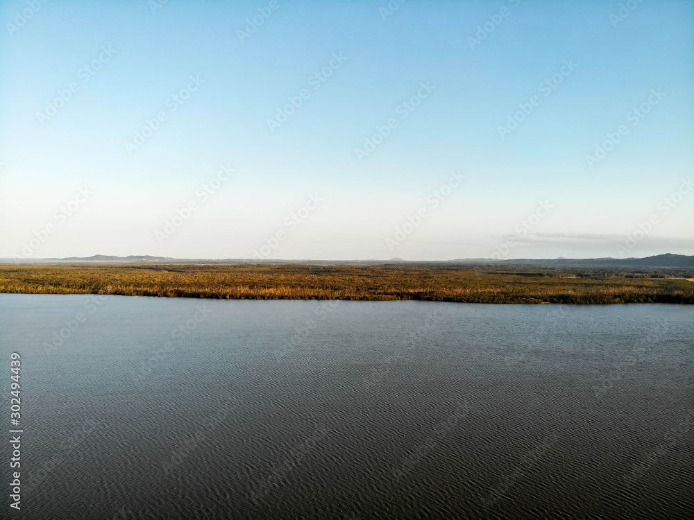 Aerial view of Boreen point lagoon and forest at sunrise