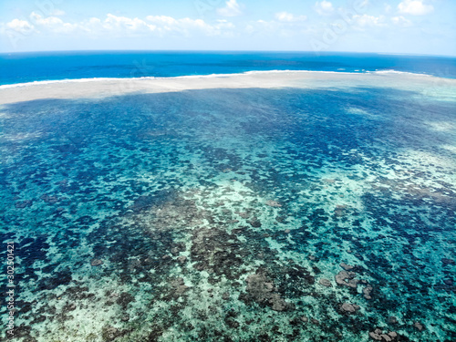 Aerial perspective of Norman Reef at the GBR, Australia © Jarrod