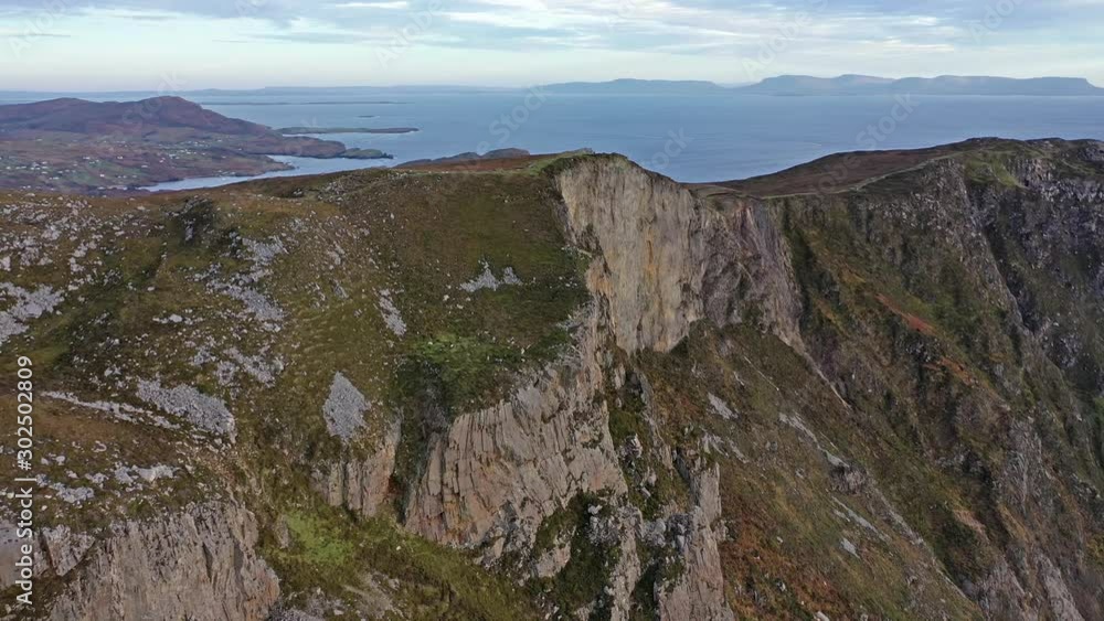 Aerial of Slieve League Cliffs are among the highest sea cliffs in Europe rising 1972 feet or 601 meters above the Atlantic Ocean - County Donegal, Ireland Aerial of Slieve League Cliffs are among the highest sea cliffs in Europe rising 1972 feet or 601 meters above the Atlantic Ocean - County Donegal, Ireland