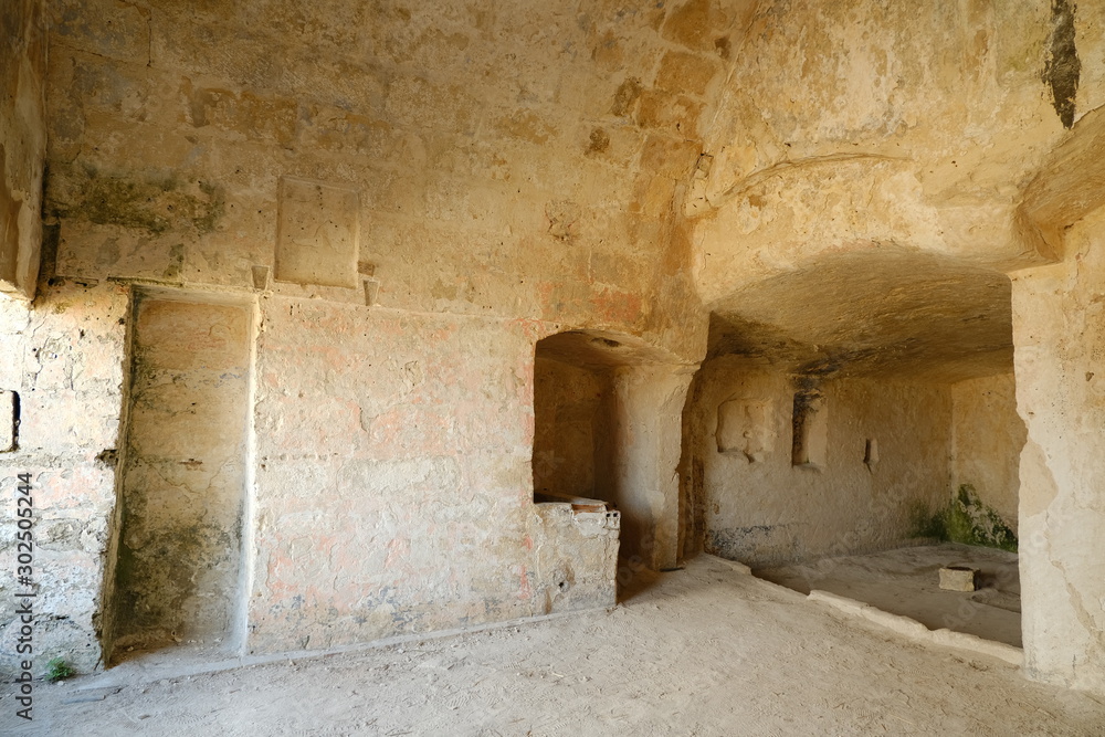 Sassi of Matera with arched ceilings and vaults. Ancient underground house dug out of the tufa rock. Sassi of Matera with arched ceilings and vaults. Ancient underground house dug out of the tufa rock.