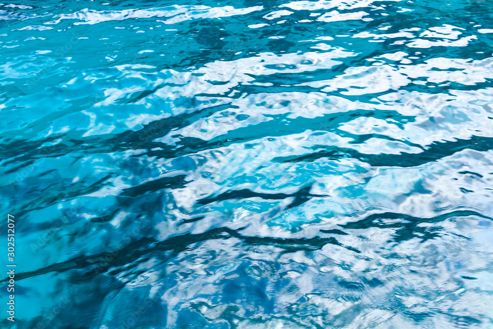 Shiny blue ocean water surface texture Shiny blue ocean water surface texture