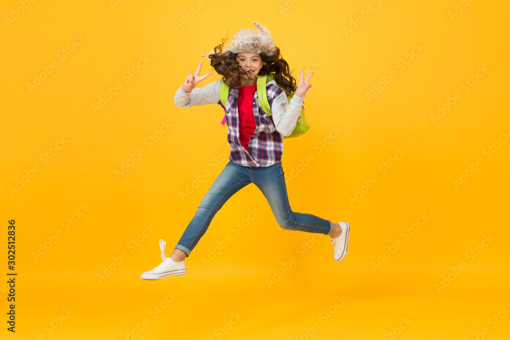 She is free. Autumn vacation has just begun. Happy girl celebrate vacation time. Small child enjoy school vacation. Day out or weekend. Vacation or school break. Holidays. Freedom She is free. Autumn vacation has just begun. Happy girl celebrate vacation time. Small child enjoy school vacation. Day out or weekend. Vacation or school break. Holidays. Freedom