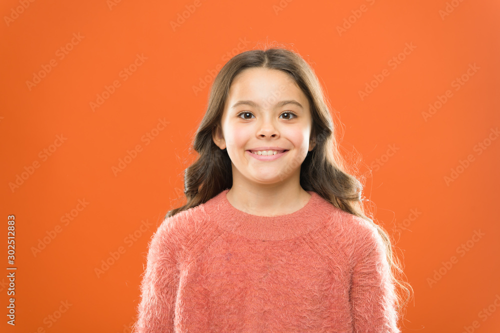 love her style. feel comfortable in casual fashion. cheerful child orange background. carefree childhood. her healthy smile. happy childrens day. cute little girl smiling. small kid autumn sweater love her style. feel comfortable in casual fashion. cheerful child orange background. carefree childhood. her healthy smile. happy childrens day. cute little girl smiling. small kid autumn sweater