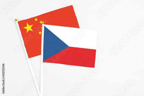 Free Download Czech Republic and China stick flags on white background. High quality fabric, miniature national flag. Peaceful global concept.White floor for copy space. - GFXLoad