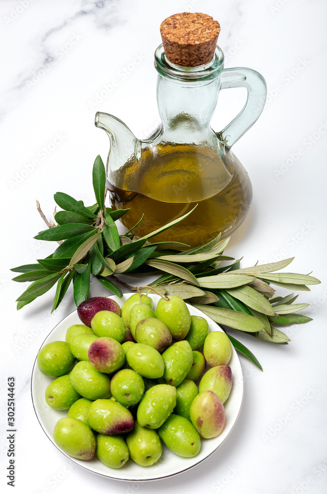 Fresh Spanish extra virgin olive oil with olives Fresh Spanish extra virgin olive oil with olives