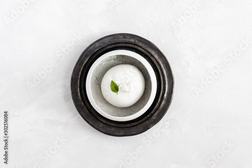 burrata cheese with basil leave top view, white background, copy space