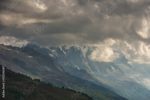 Evening and morning view of the town of Chamonix and Mount Mont Blanc. 