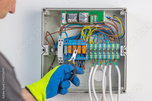 large shield room. it has a lot of wires. the master connects the Internet. also organizes smart home management