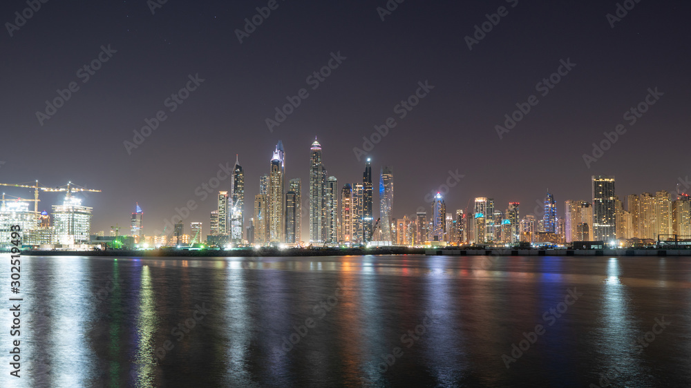 Dubai city skyline at night showing JBR Dubai city skyline at night showing JBR