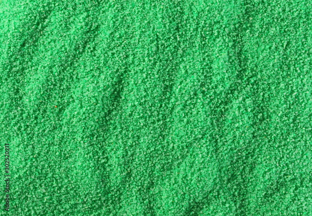 Sand green background and texture, top view Sand green background and texture, top view