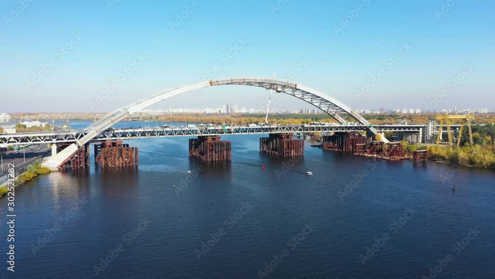 Unfinished Bridge on the River in a Kyiv city. Camera movement from bottom to top. Unfinished Bridge on the River in a Kyiv city. Camera movement from bottom to top.
