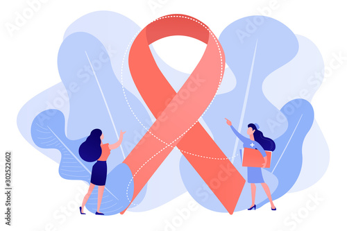 Doctor showing breast cancer awareness ribbon to the female patient. Breast cancer, women oncology factor, breast cancer prevention concept. Pinkish coral bluevector vector isolated illustration photo