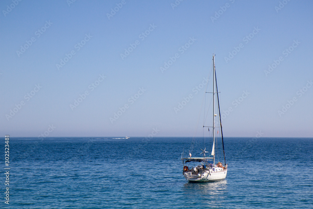 La Herradura, Malaga / Spain - August 07 2108 : Landscape View of yachting boat in Mediterranean Sea