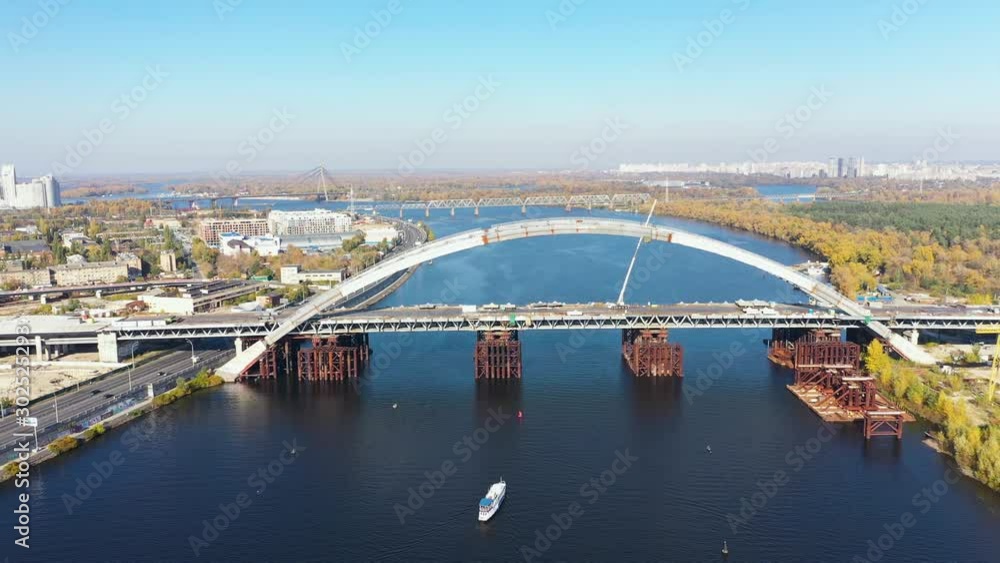 Unfinished Bridge on the River in a Kiev city. Camera Tracking from right to left. Unfinished Bridge on the River in a Kiev city. Camera Tracking from right to left.
