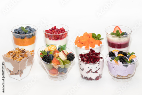 Canapes Cream dessert and fruit on a table in a restaurant