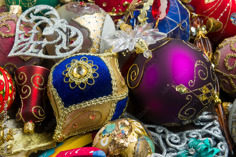 Christmas tree toys, new year balls, bells, icicles and other decoration, winter holidays and celebrations concept, selective focus Christmas tree toys, new year balls, bells, icicles and other decoration, winter holidays and celebrations concept, selective focus