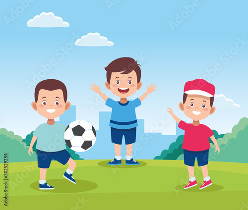 cartoon happy boys playing with a soccer ball