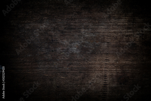 Empty dark wood background to insert. space for text.