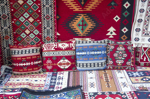 Colorful traditional carpets and pillows in Albania