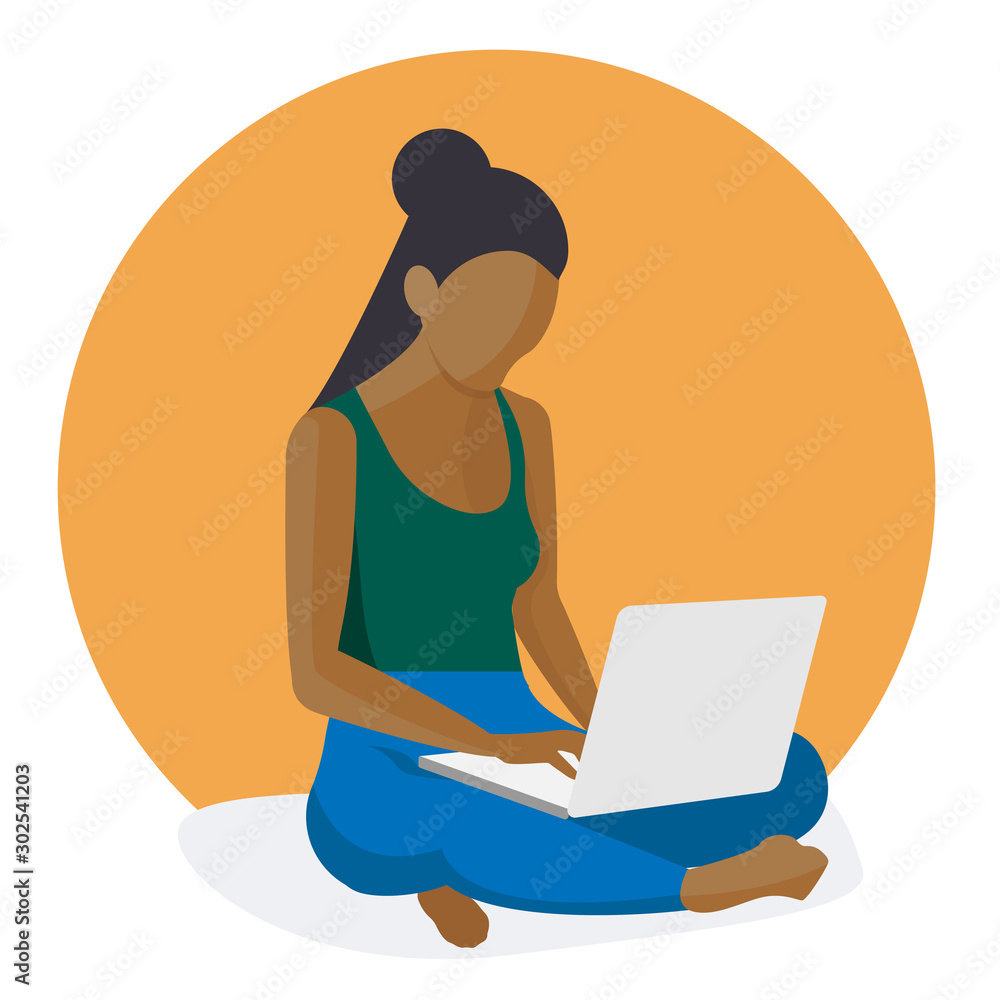 Mixed Race Woman working on laptop, Sitting Crosslegged on the floor Mixed Race Woman working on laptop, Sitting Crosslegged on the floor