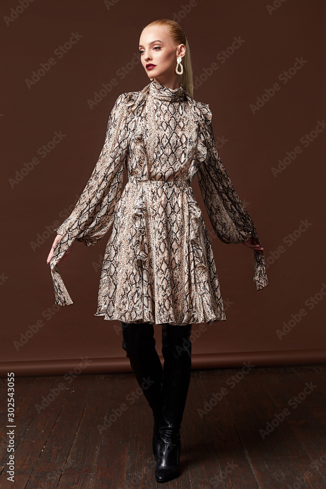 Fotografia do Stock: Pretty fashion model wear clothes silk dress
